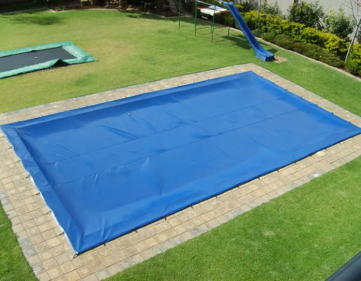 Swimming pool covering tarpaulin in PVC 650 gr, with eyelets